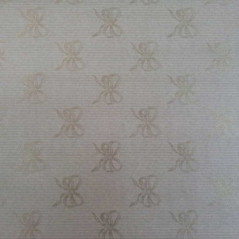 Papel de regalo kraft verjurado natural con lazos oro